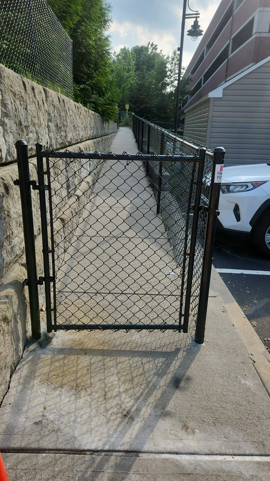 Chain link fence installation by Friends and Fence