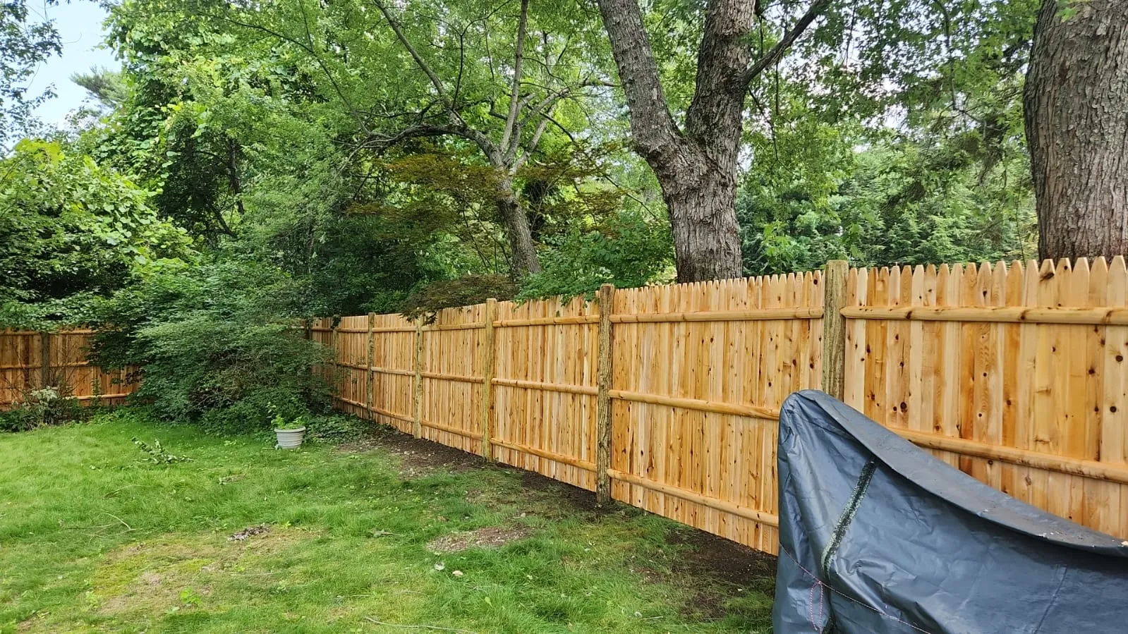 Wood fence installation by Friends and Fence
